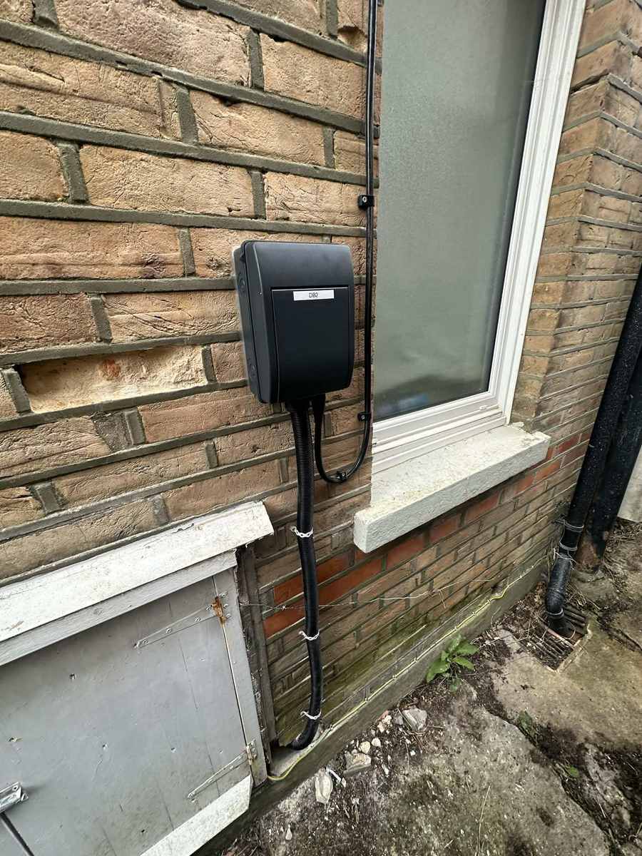 Distribution board installed on an exterior wall